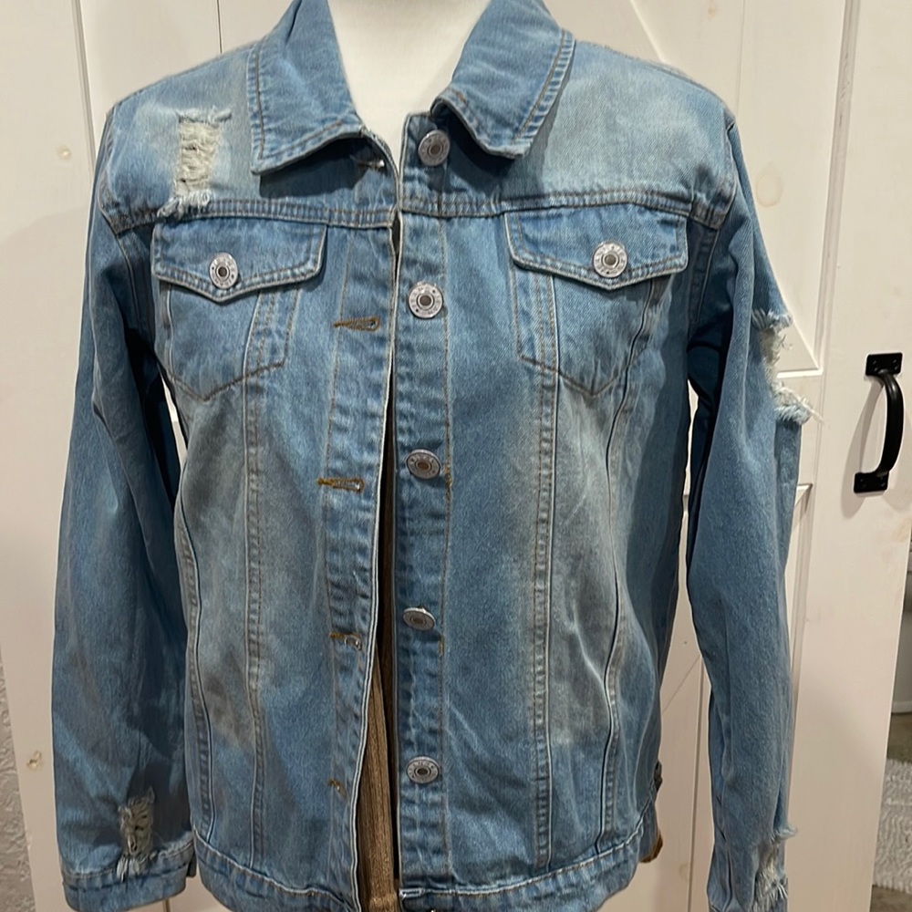 Distressed jean jacket